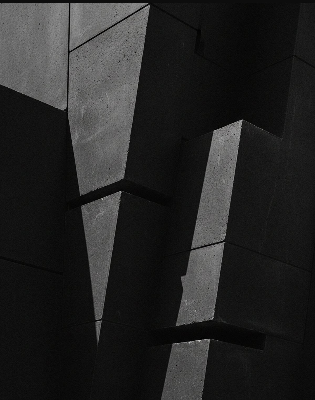 Detail of a stacked concrete facade in raking light